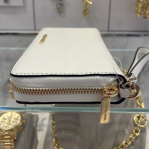 MICHAEL KORS
Leather Continental Wristlet Phone Case Wallet 
Optic White
NWT - Picture 12 of 16